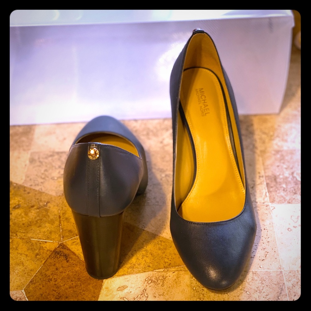 Michael Kors. Navy. 3 1/2 in heel.